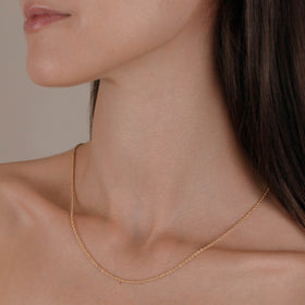 cadena de Oro 10K vista lateral — aretes finos para dama. RG Joyeros.