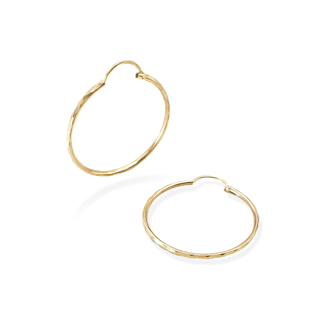 ARRACADA FACETADA 3CM ORO 10K