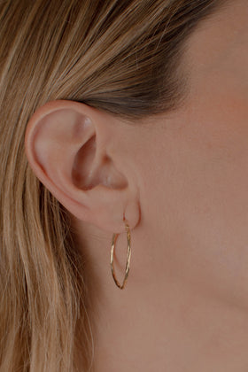 ARRACADA TORSAL 2.5CM ORO 10K