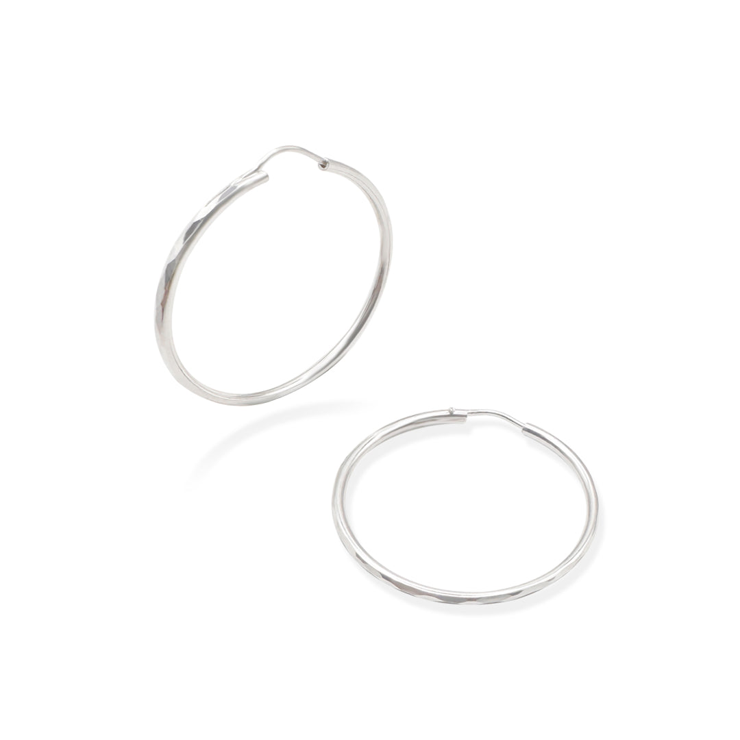 ARRACADA FACETADA 3CM PLATA .925