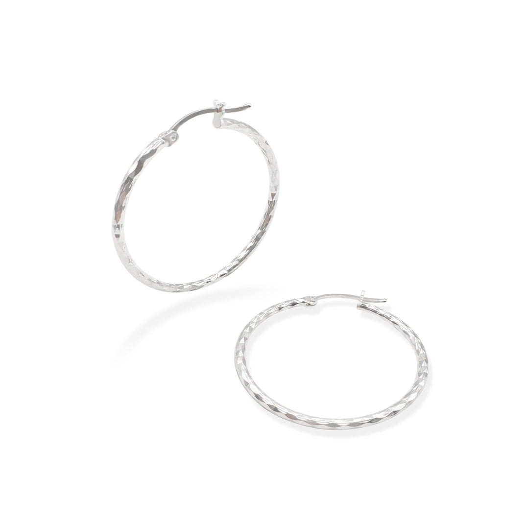 ARRACADA FACETADA ROMBOS 3CM PLATA .925