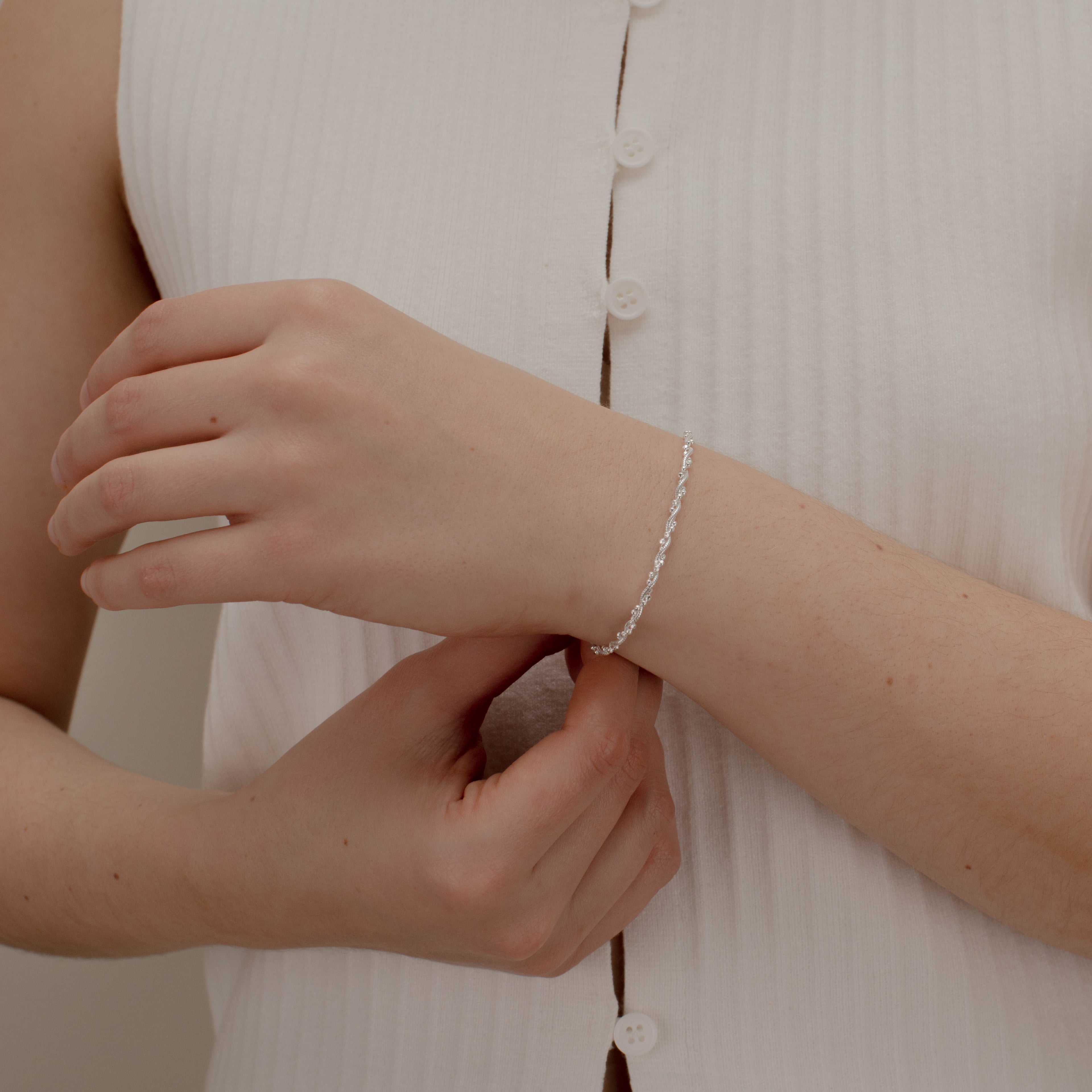 PULSERA MONORRIEL BOLITAS TRENSADA 2MM PLATA .925